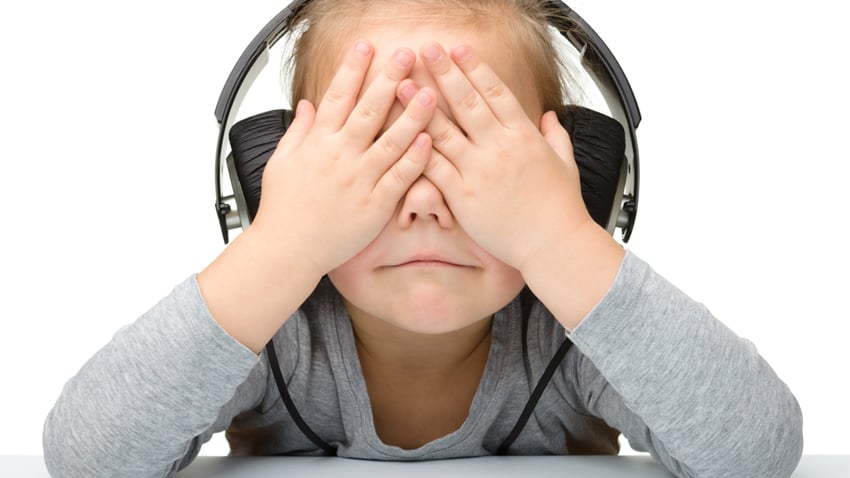Sad child headphones